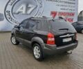 Чорний Хендай Туксон, об'ємом двигуна 2 л та пробігом 270 тис. км за 7500 $, фото 4 на Automoto.ua