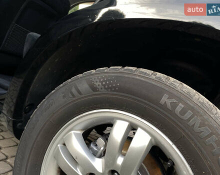 Чорний Хендай Туксон, об'ємом двигуна 1.98 л та пробігом 233 тис. км за 7650 $, фото 73 на Automoto.ua