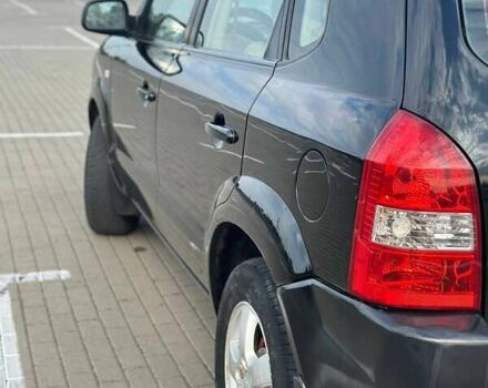 Черный Хендай Туксон, объемом двигателя 1.98 л и пробегом 277 тыс. км за 5350 $, фото 11 на Automoto.ua