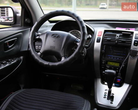 Черный Хендай Туксон, объемом двигателя 2.66 л и пробегом 217 тыс. км за 8600 $, фото 10 на Automoto.ua