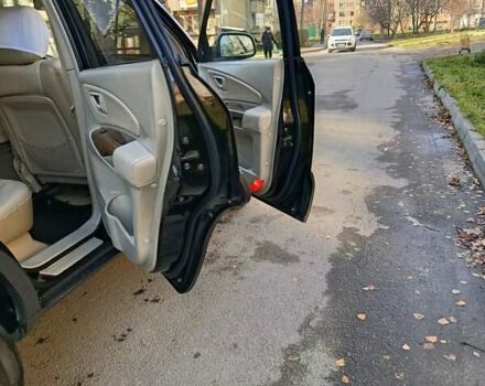 Черный Хендай Туксон, объемом двигателя 1.98 л и пробегом 256 тыс. км за 8000 $, фото 8 на Automoto.ua