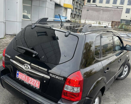 Черный Хендай Туксон, объемом двигателя 2 л и пробегом 194 тыс. км за 7250 $, фото 7 на Automoto.ua