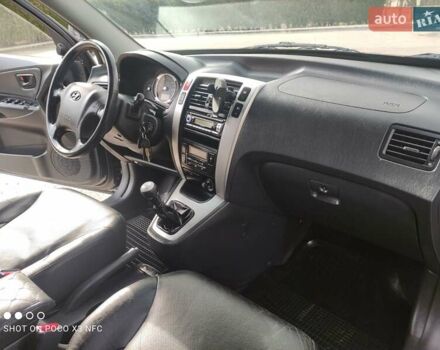 Черный Хендай Туксон, объемом двигателя 2 л и пробегом 237 тыс. км за 7999 $, фото 37 на Automoto.ua