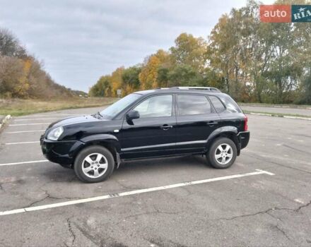 Черный Хендай Туксон, объемом двигателя 2 л и пробегом 127 тыс. км за 7590 $, фото 28 на Automoto.ua