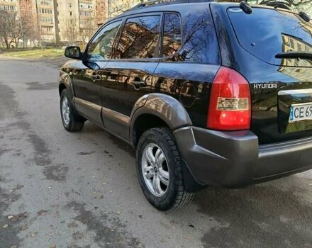 Черный Хендай Туксон, объемом двигателя 1.98 л и пробегом 256 тыс. км за 8000 $, фото 15 на Automoto.ua
