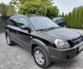 Черный Хендай Туксон, объемом двигателя 2 л и пробегом 298 тыс. км за 2200 $, фото 1 на Automoto.ua