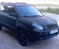Черный Хендай Туксон, объемом двигателя 2 л и пробегом 495 тыс. км за 3800 $, фото 1 на Automoto.ua