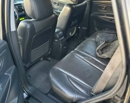 Черный Хендай Туксон, объемом двигателя 2 л и пробегом 235 тыс. км за 6700 $, фото 5 на Automoto.ua