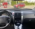 Черный Хендай Туксон, объемом двигателя 2 л и пробегом 238 тыс. км за 9500 $, фото 9 на Automoto.ua