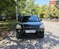 Черный Хендай Туксон, объемом двигателя 2 л и пробегом 247 тыс. км за 6300 $, фото 9 на Automoto.ua