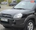 Чорний Хендай Туксон, об'ємом двигуна 1.98 л та пробігом 123 тис. км за 7950 $, фото 14 на Automoto.ua