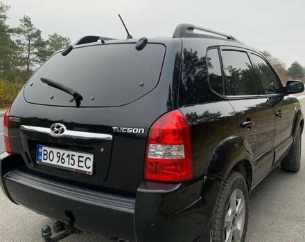 Черный Хендай Туксон, объемом двигателя 1.98 л и пробегом 196 тыс. км за 7700 $, фото 5 на Automoto.ua
