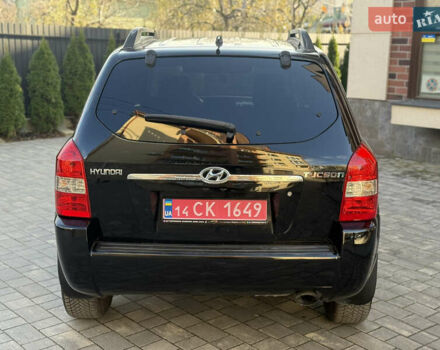 Черный Хендай Туксон, объемом двигателя 2 л и пробегом 249 тыс. км за 7450 $, фото 9 на Automoto.ua