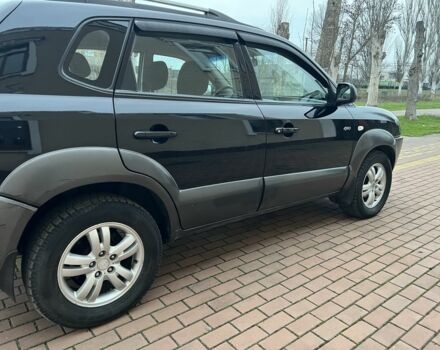 Черный Хендай Туксон, объемом двигателя 2 л и пробегом 220 тыс. км за 7200 $, фото 13 на Automoto.ua