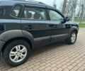 Черный Хендай Туксон, объемом двигателя 2 л и пробегом 220 тыс. км за 7200 $, фото 13 на Automoto.ua