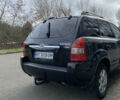Черный Хендай Туксон, объемом двигателя 1.99 л и пробегом 290 тыс. км за 7700 $, фото 2 на Automoto.ua