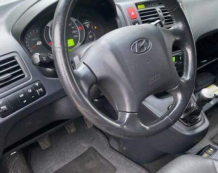 Чорний Хендай Туксон, об'ємом двигуна 1.98 л та пробігом 202 тис. км за 7350 $, фото 20 на Automoto.ua