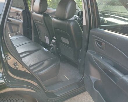 Черный Хендай Туксон, объемом двигателя 2 л и пробегом 180 тыс. км за 7600 $, фото 7 на Automoto.ua