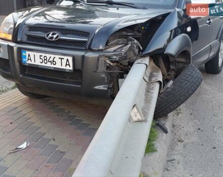 Черный Хендай Туксон, объемом двигателя 2.7 л и пробегом 275 тыс. км за 5500 $, фото 1 на Automoto.ua