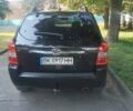 Черный Хендай Туксон, объемом двигателя 1.98 л и пробегом 225 тыс. км за 7500 $, фото 8 на Automoto.ua