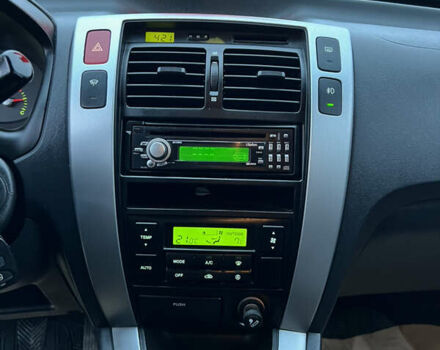 Чорний Хендай Туксон, об'ємом двигуна 1.98 л та пробігом 170 тис. км за 6999 $, фото 40 на Automoto.ua