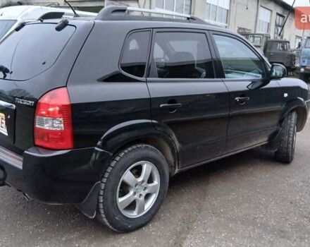 Чорний Хендай Туксон, об'ємом двигуна 1.98 л та пробігом 320 тис. км за 6500 $, фото 6 на Automoto.ua