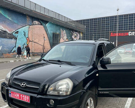 Черный Хендай Туксон, объемом двигателя 1.98 л и пробегом 170 тыс. км за 7750 $, фото 2 на Automoto.ua