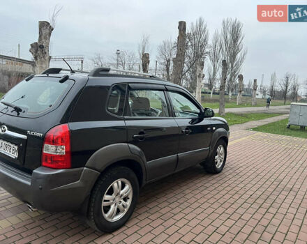 Черный Хендай Туксон, объемом двигателя 1.98 л и пробегом 227 тыс. км за 6900 $, фото 13 на Automoto.ua