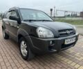 Черный Хендай Туксон, объемом двигателя 2 л и пробегом 220 тыс. км за 7200 $, фото 3 на Automoto.ua