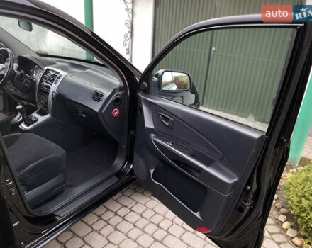 Чорний Хендай Туксон, об'ємом двигуна 1.98 л та пробігом 233 тис. км за 7650 $, фото 43 на Automoto.ua