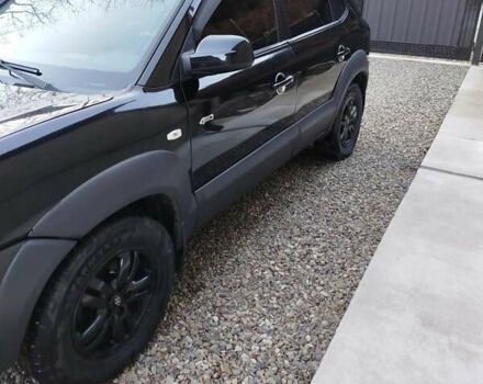 Черный Хендай Туксон, объемом двигателя 2.7 л и пробегом 290 тыс. км за 7300 $, фото 1 на Automoto.ua