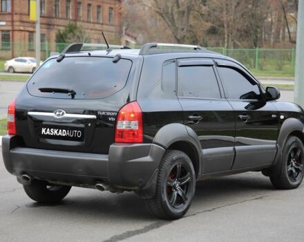 Черный Хендай Туксон, объемом двигателя 2.7 л и пробегом 217 тыс. км за 8600 $, фото 5 на Automoto.ua