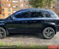 Черный Хендай Туксон, объемом двигателя 2 л и пробегом 18 тыс. км за 6900 $, фото 1 на Automoto.ua