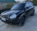 Чорний Хендай Туксон, об'ємом двигуна 2 л та пробігом 195 тис. км за 8500 $, фото 14 на Automoto.ua