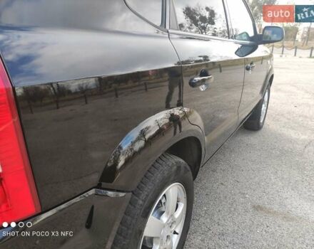 Черный Хендай Туксон, объемом двигателя 2 л и пробегом 237 тыс. км за 7999 $, фото 42 на Automoto.ua