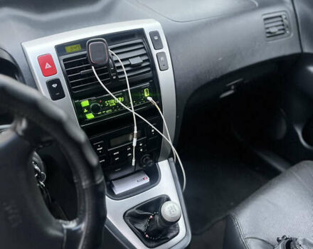 Черный Хендай Туксон, объемом двигателя 2 л и пробегом 242 тыс. км за 6999 $, фото 17 на Automoto.ua