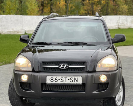 Черный Хендай Туксон, объемом двигателя 2 л и пробегом 216 тыс. км за 7500 $, фото 5 на Automoto.ua