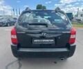 Чорний Хендай Туксон, об'ємом двигуна 2 л та пробігом 306 тис. км за 6900 $, фото 4 на Automoto.ua