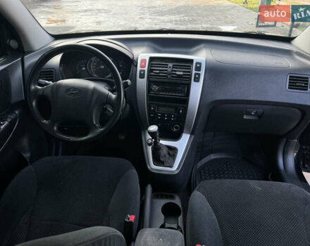 Черный Хендай Туксон, объемом двигателя 2 л и пробегом 355 тыс. км за 7000 $, фото 14 на Automoto.ua