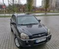 Чорний Хендай Туксон, об'ємом двигуна 2 л та пробігом 270 тис. км за 7500 $, фото 11 на Automoto.ua