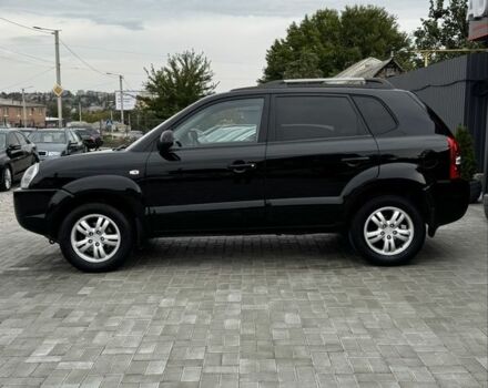 Черный Хендай Туксон, объемом двигателя 2 л и пробегом 163 тыс. км за 8400 $, фото 7 на Automoto.ua