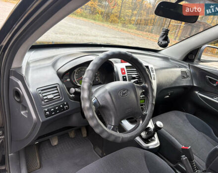 Хендай Туксон 2006 у Тернополі на Automoto.ua Чорний Хендай Туксон, об'ємом двигуна 1.99 л та пробігом 240 тис. км за 7600 $, фото 23 на Automoto.ua