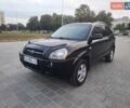 Черный Хендай Туксон, объемом двигателя 2 л и пробегом 218 тыс. км за 8200 $, фото 1 на Automoto.ua