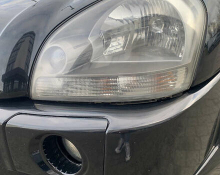 Черный Хендай Туксон, объемом двигателя 1.99 л и пробегом 290 тыс. км за 7700 $, фото 27 на Automoto.ua