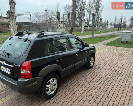 Черный Хендай Туксон, объемом двигателя 1.98 л и пробегом 227 тыс. км за 6900 $, фото 14 на Automoto.ua