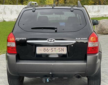 Черный Хендай Туксон, объемом двигателя 2 л и пробегом 216 тыс. км за 7500 $, фото 6 на Automoto.ua