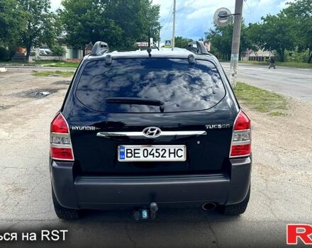 Черный Хендай Туксон, объемом двигателя 2 л и пробегом 192 тыс. км за 7700 $, фото 3 на Automoto.ua