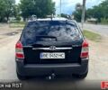 Черный Хендай Туксон, объемом двигателя 2 л и пробегом 192 тыс. км за 7700 $, фото 3 на Automoto.ua