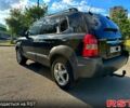 Чорний Хендай Туксон, об'ємом двигуна 2 л та пробігом 250 тис. км за 5600 $, фото 1 на Automoto.ua