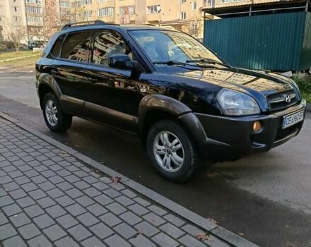 Черный Хендай Туксон, объемом двигателя 1.98 л и пробегом 256 тыс. км за 8000 $, фото 1 на Automoto.ua